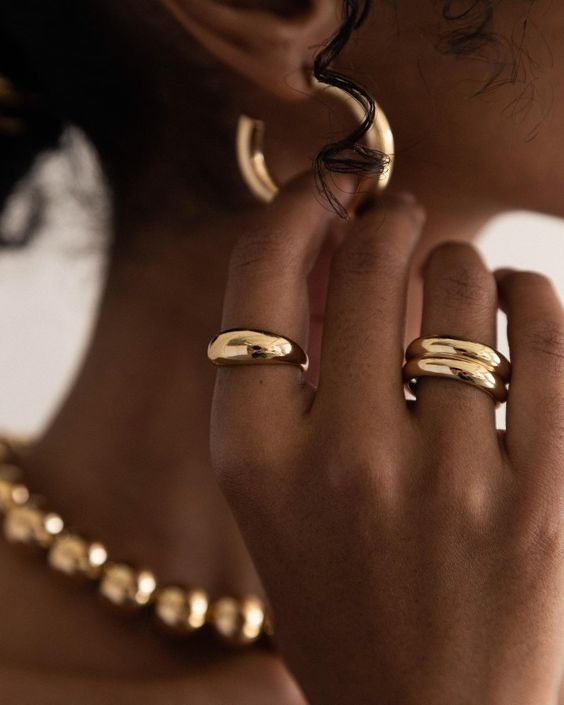 Gold rings worn on fingers